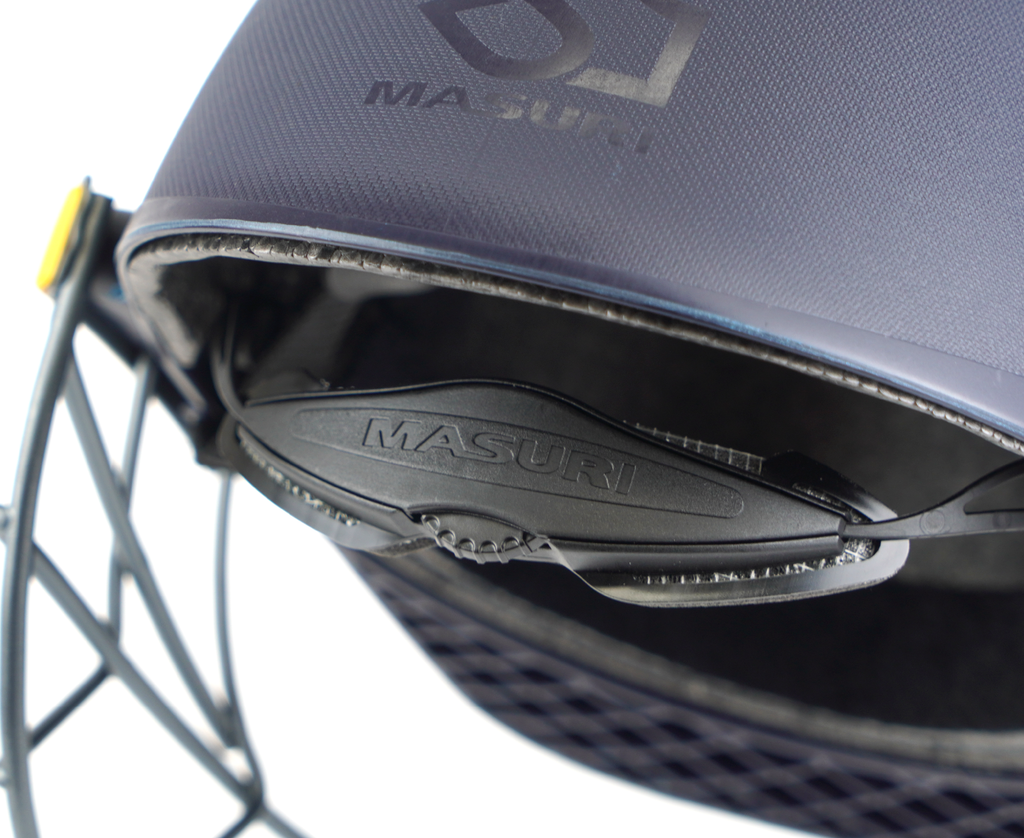 Batter wearing the Masuri C Line steel cricket helmet while facing a bowler