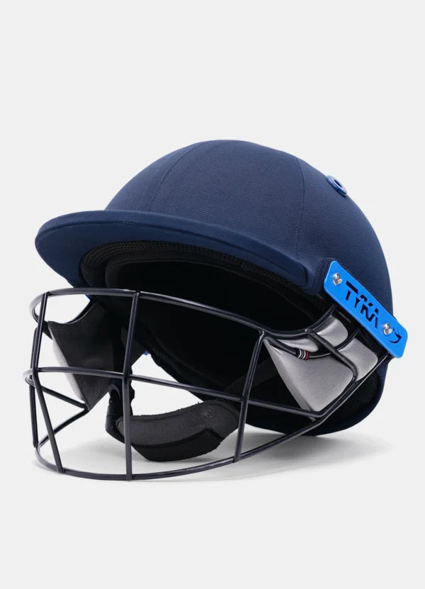 Batter wearing the Tyka Force Match cricket helmet during a match