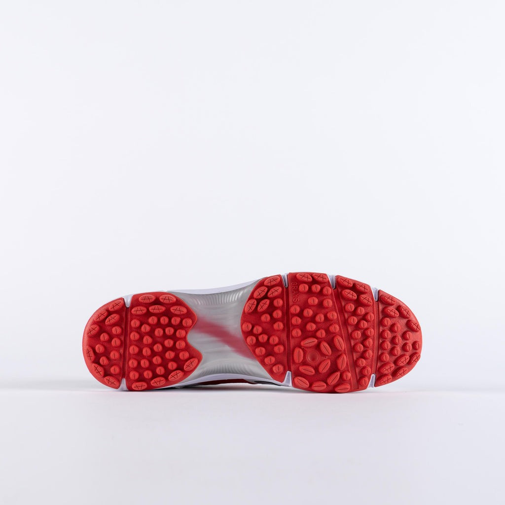 Close-up of a shoe sole with red tread pattern Gray Nicolls Velocity 4.0 cricket shoes white red black colour