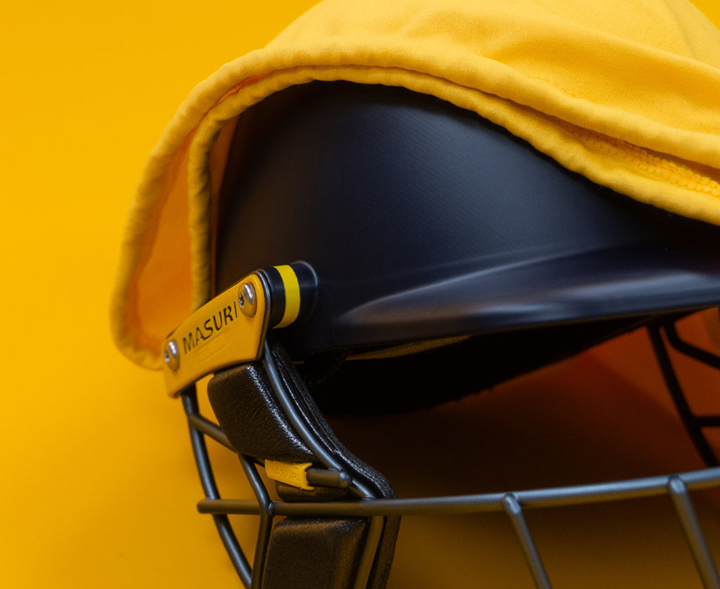Rear view of the Masuri T Line Plus cricket helmet with back shell and strap