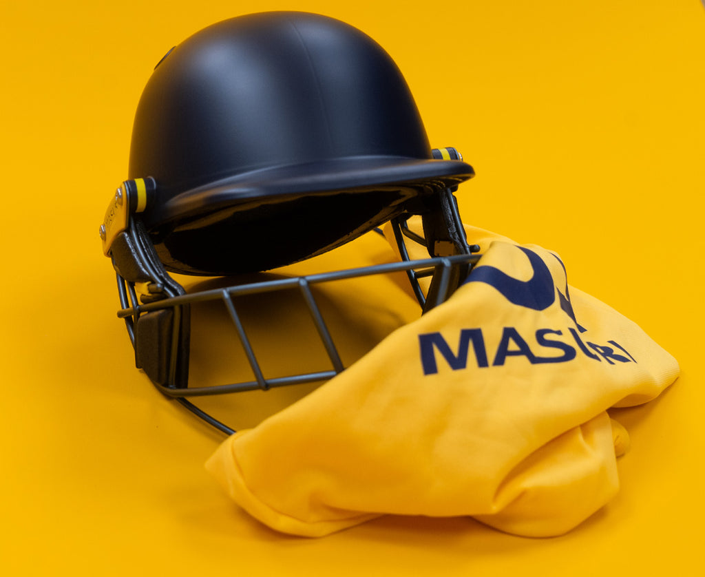 Peak and top shell of the Masuri T Line Plus titanium cricket helmet