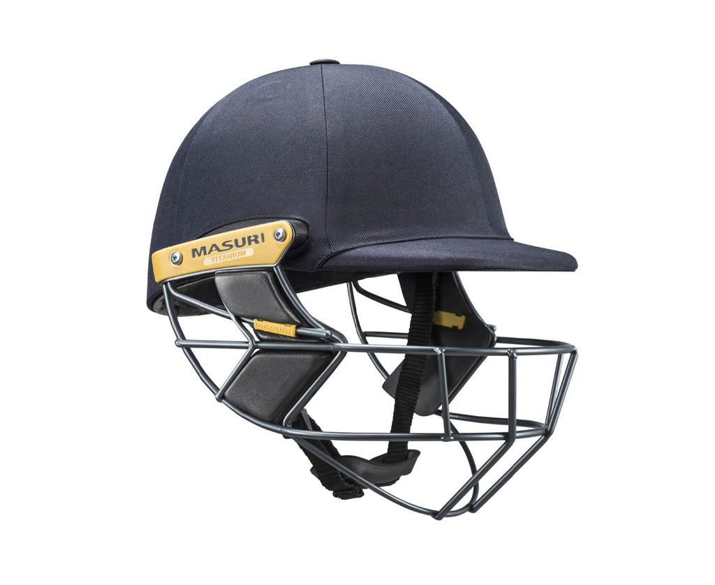 Black cricket helmet with a metal grill on a white background, Masuri T Line titanium cricket helmet in a studio front view