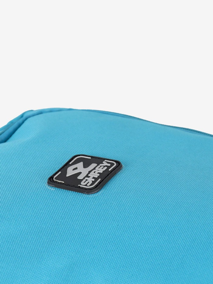 Blue bag with a black logo Close-up of durable wheels on Shrey Kare wheelie cricket kit bag
