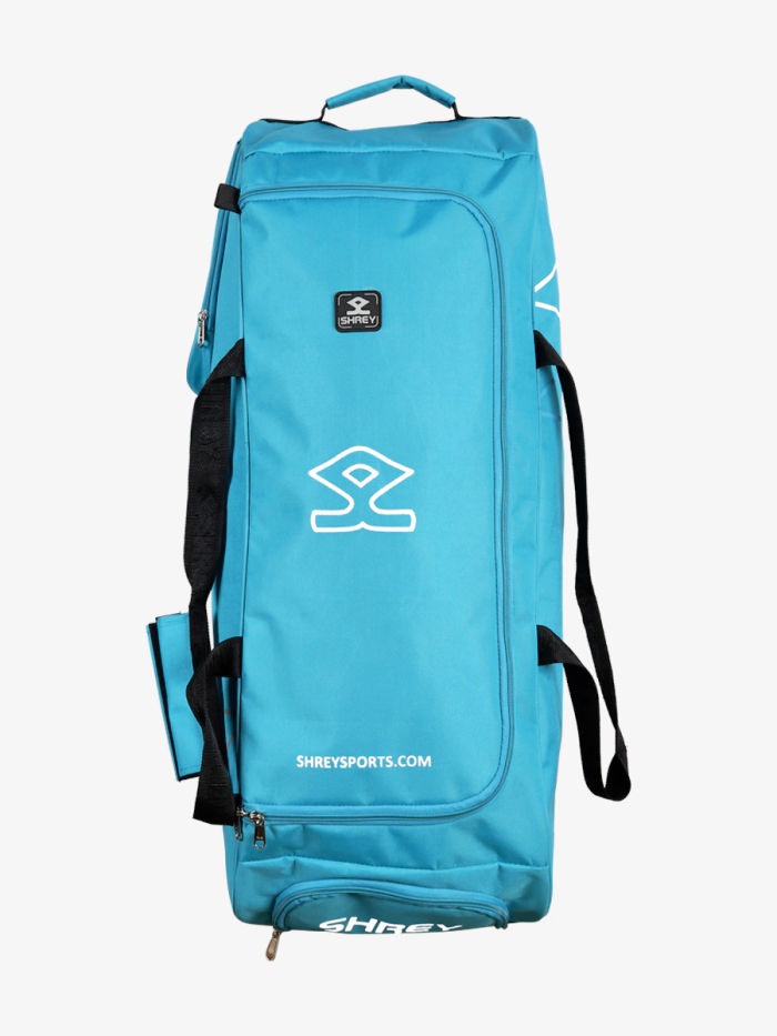 A blue Shrey Kare Wheelie Cricket Kit Bag with black straps with wheels, front view