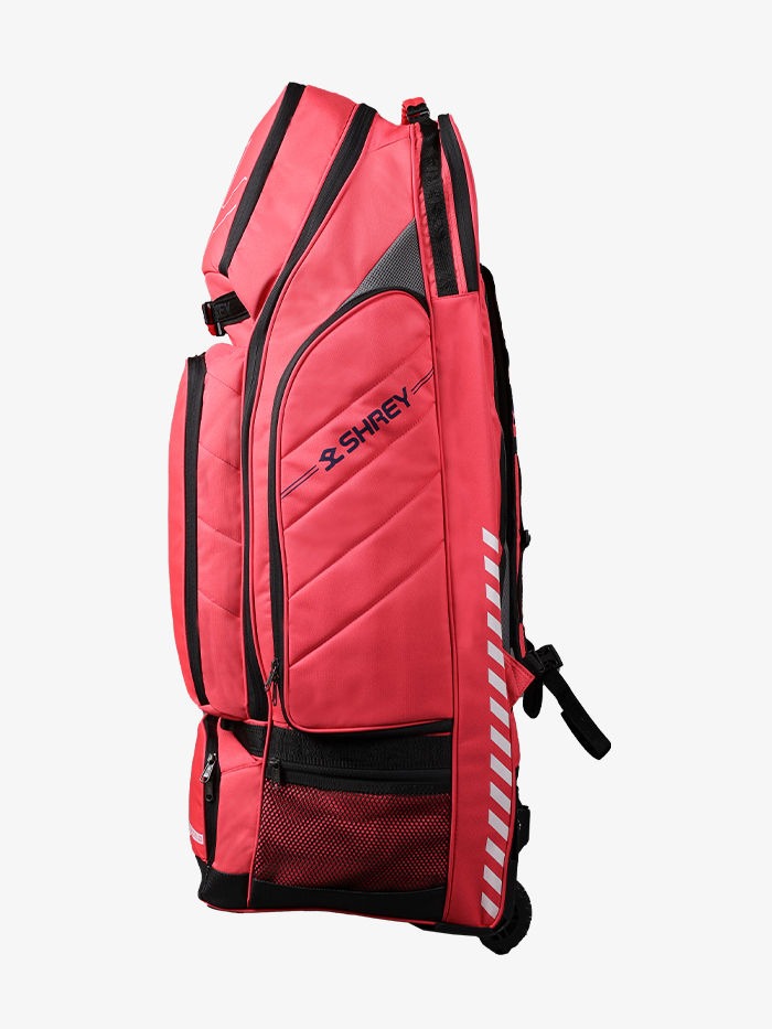 Red sports bag with black accents and a visible brand logo on a white background