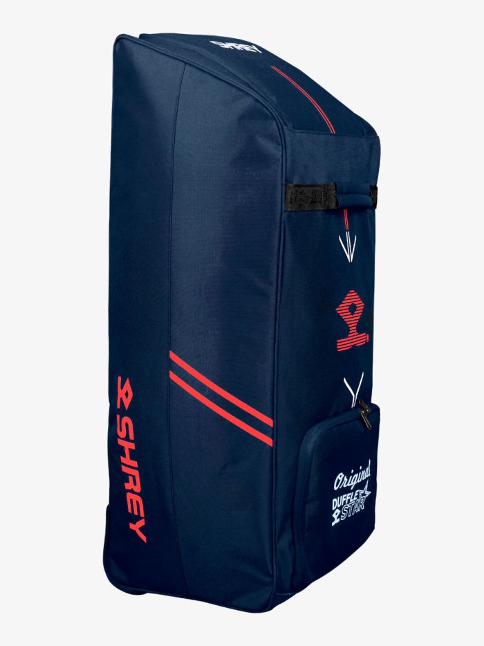 Navy blue sports bag with red Shrey Star duffle cricket kit bag packed with bat, pads and helmet