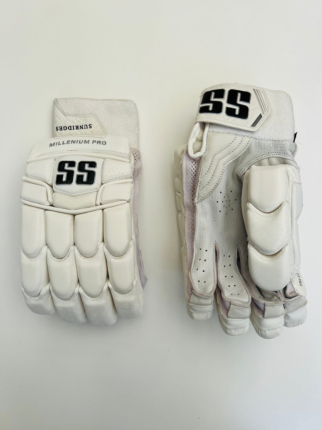 Pair of SS Millennium Pro men's batting gloves on a plain background
