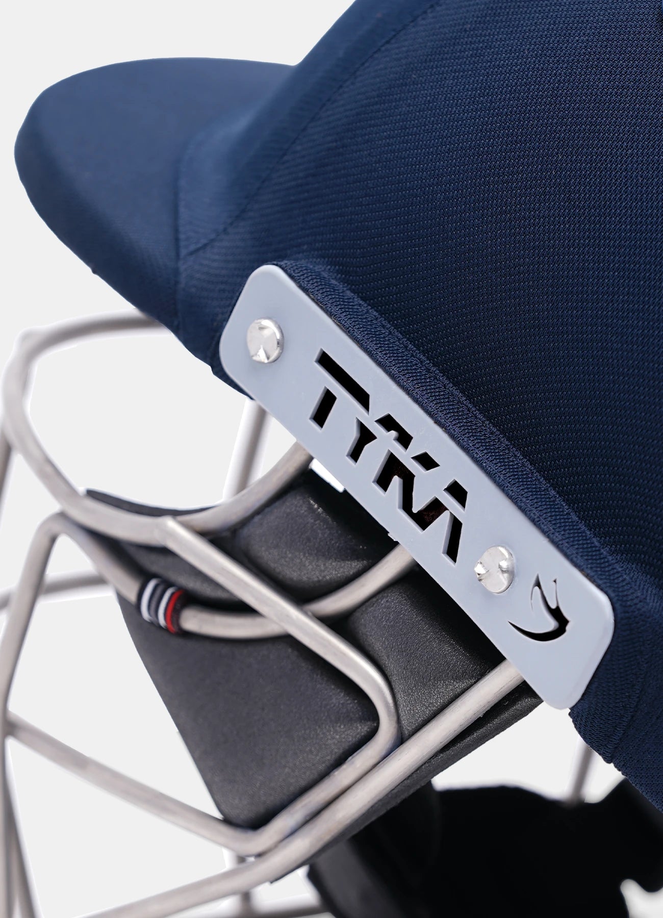 Chin strap and fastening on the Tyka Force Match Titanium cricket helmet