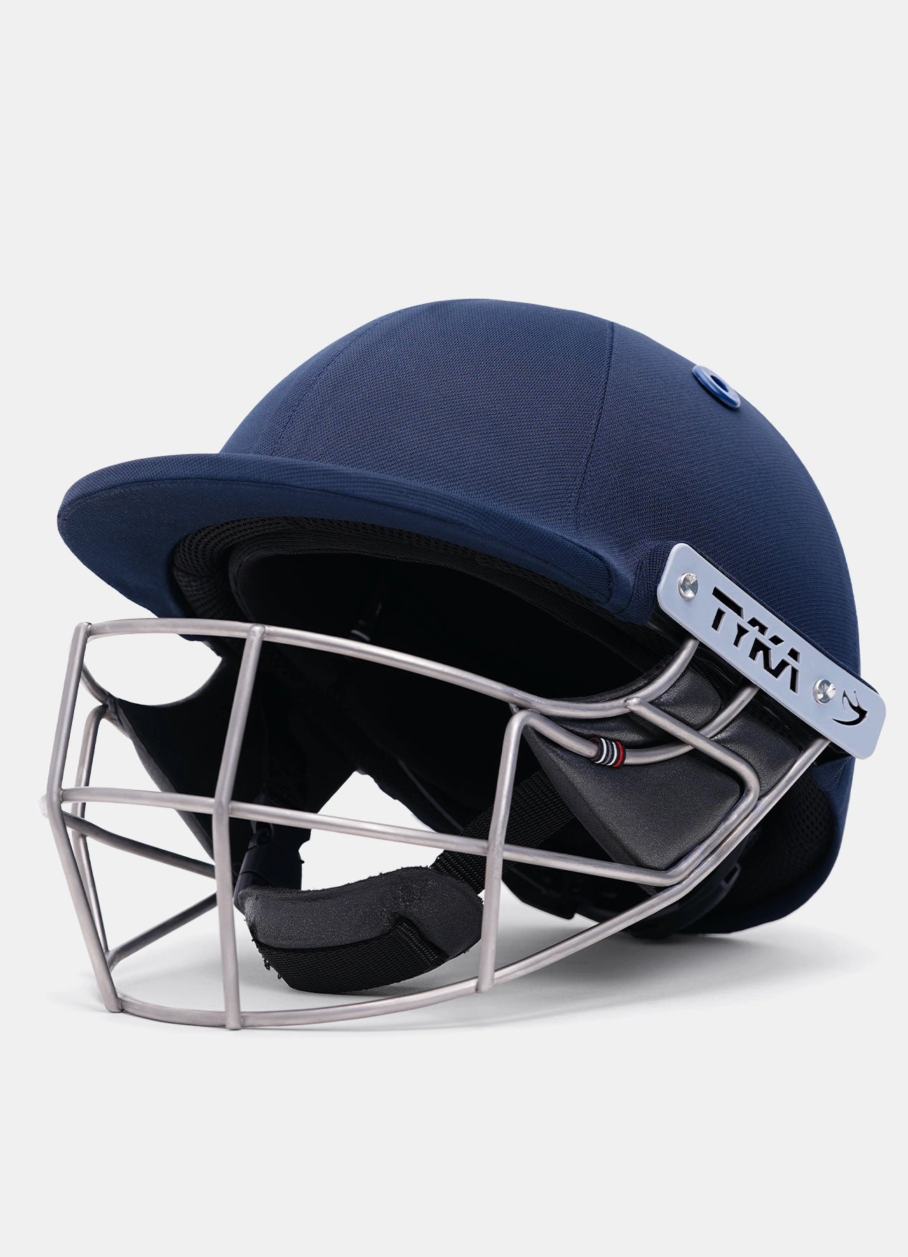 Side profile of the Tyka Force Match Titanium cricket helmet showing the shell shape